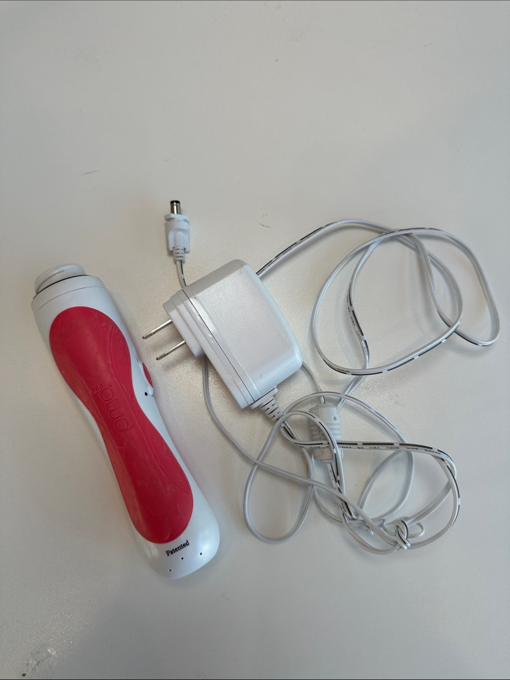 PMD Facial Device and Charger - White & Pink